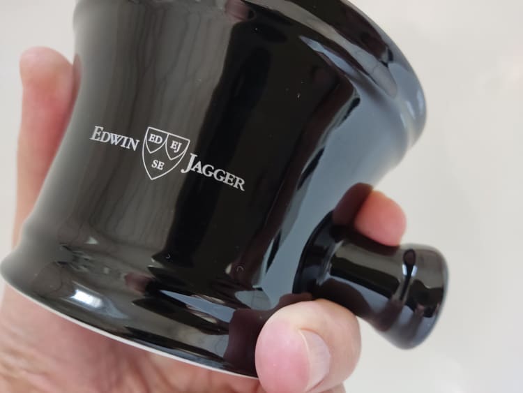 close up holding an Edwin Jagger Black Shaving Bowl with Handle