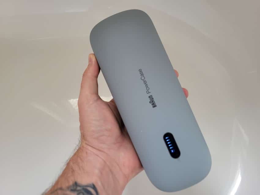 Braun Series 9 Pro powercase held in hand charging the shaver