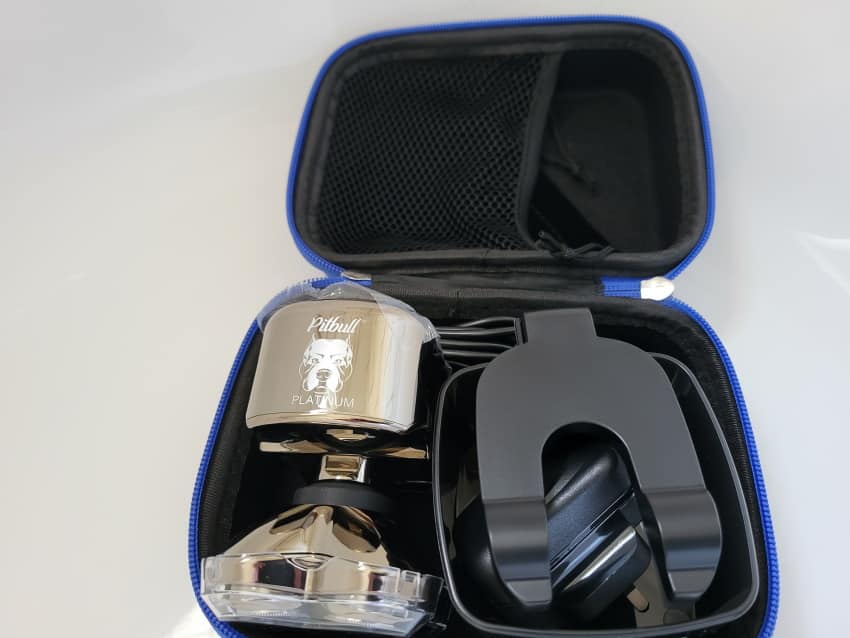 Skull Shaver blue travel case with Platinum Pro Shaver and accessories inside