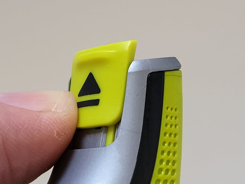 close up of button to remove a blade from a Philips OneBlade shaver