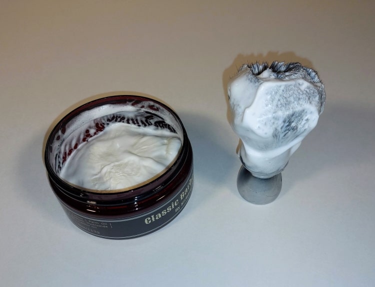 shaving brush and Sir Hare Shaving Soap with lather side by side