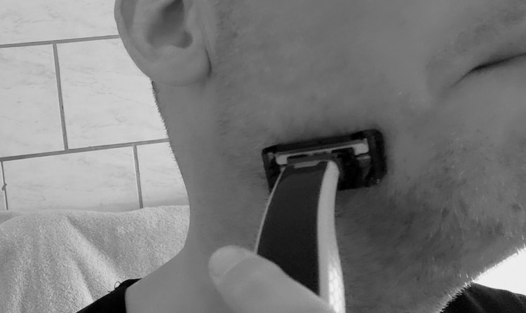 trimming a beard with the Philips OneBlade stubble comb attached