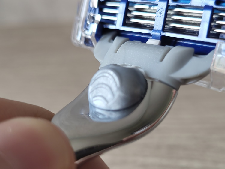 close up of Gillette Mach3 Turbo button for releasing the blade