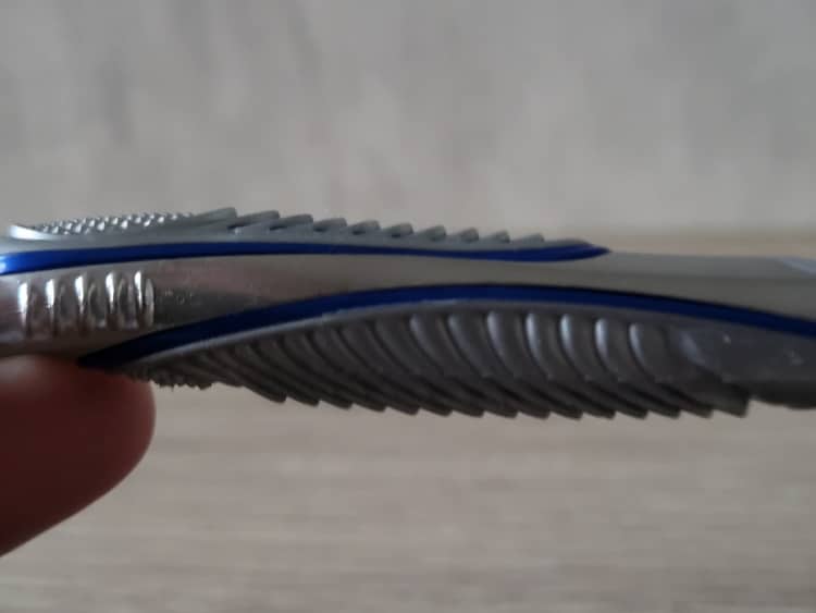 close up of Gillette SkinGuard razor handle showing its rubberized grip