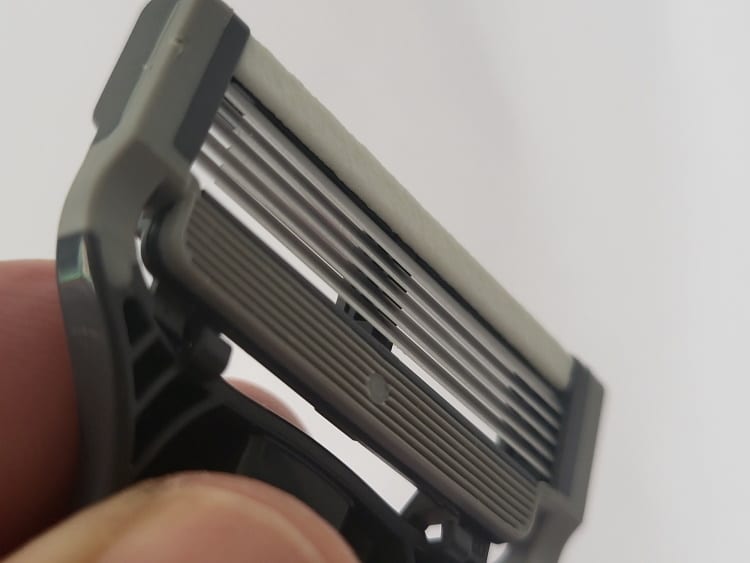 close up of Harrys razor blade showing the microfin strip