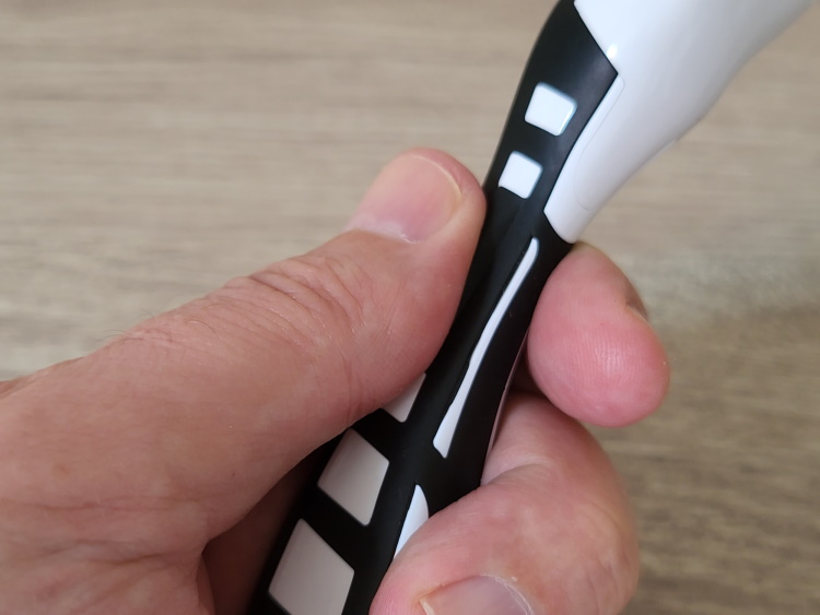 close up of BIC Flex 5 Hybrid razor handle to display its rubberized grip