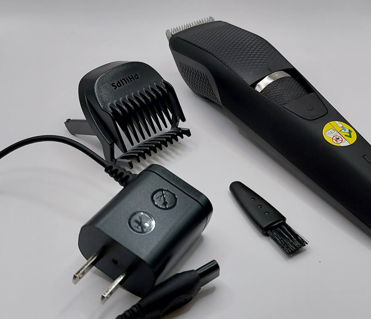 Philips Norelco Series 3000 beard trimmer unboxed with all components and trimmer