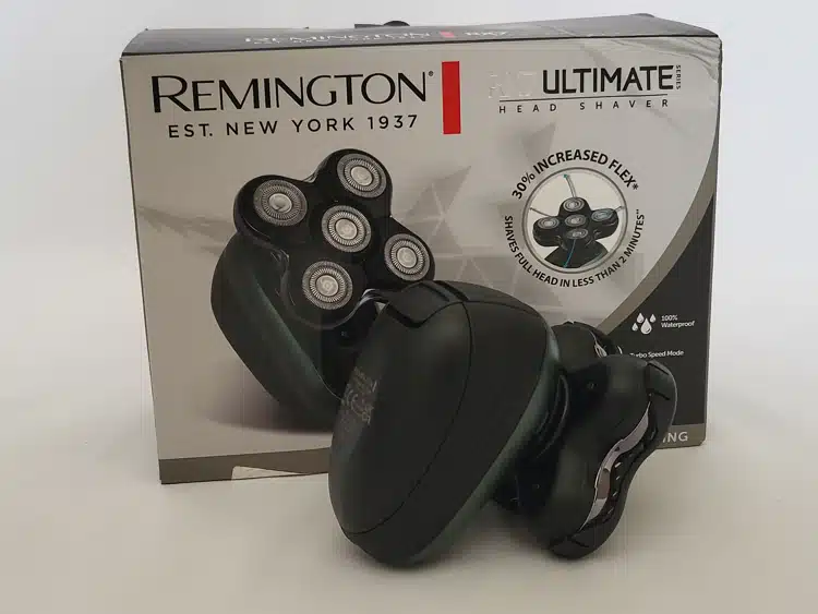 Remington RX7 Ultimate Series Head Shaver in front of presentation box