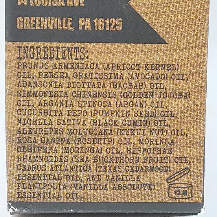 close up of Honest Amish Premium Beard Oil ingredients on the box