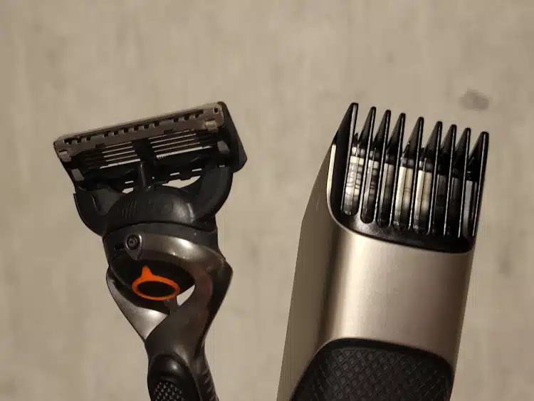 Trimmer and razor held next to each other