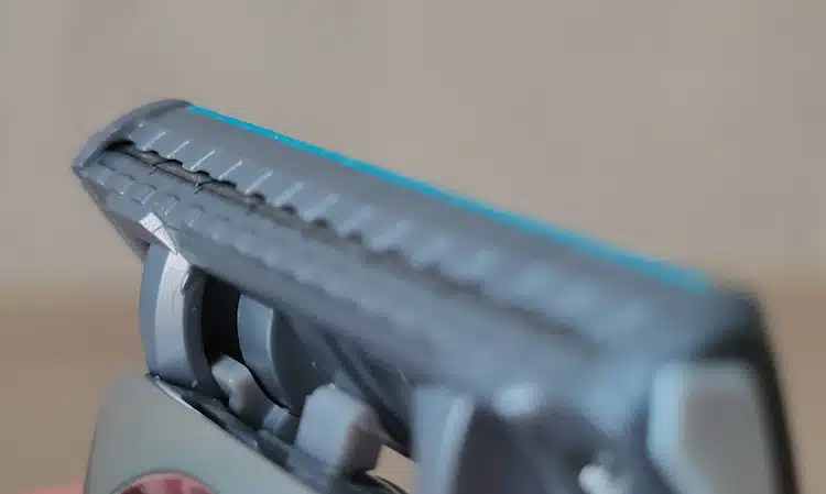 close up of Schick Quattro Titanium detail trimmer on the top of the cartidge blade