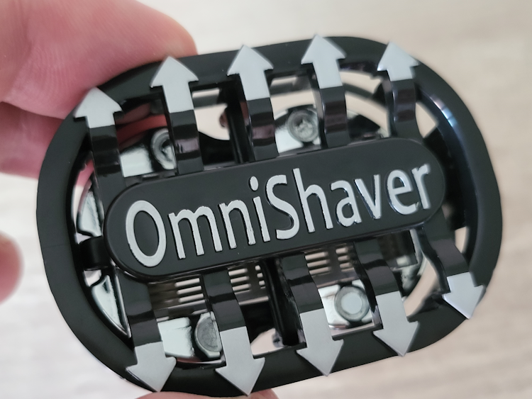 back of OmniShaver Premium showing arrows where to shave