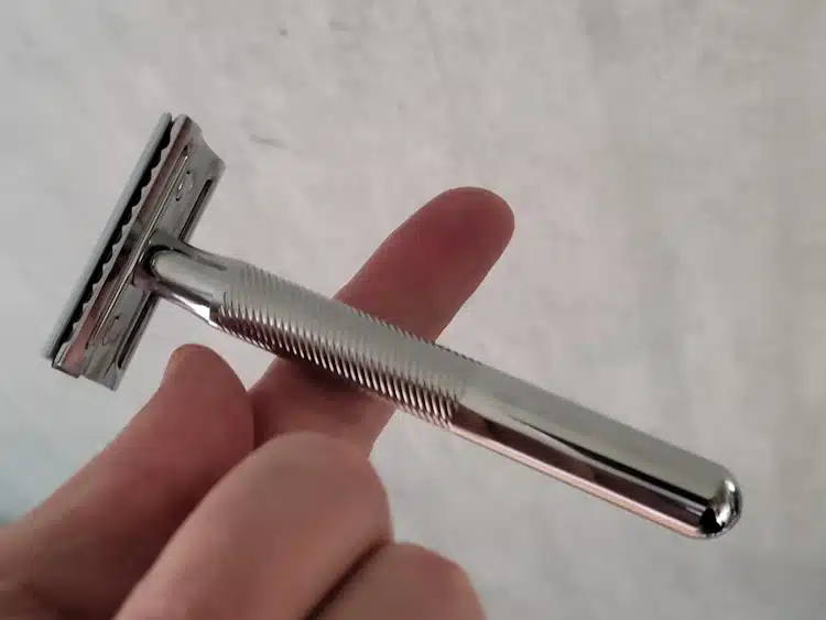 balancing the King C. Gillette Double Edge Safety Razor on my finger to show its balance