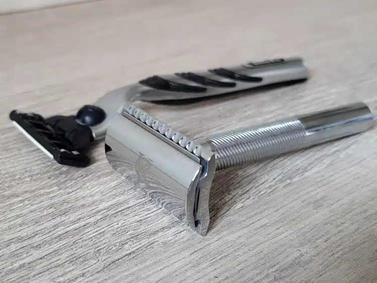 cartridge razor and safety razor next to each other to compare