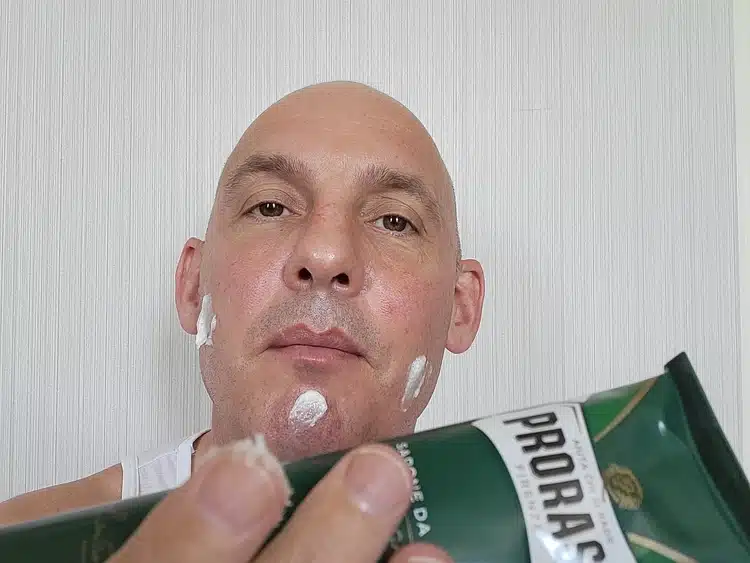 author Jason adding blobs of shaving cream on his face