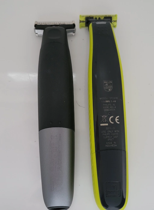 Braun Xt5 next to Philips Norelco OneBlade to compare the length