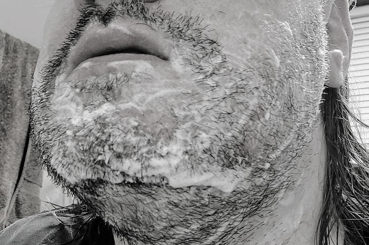 close up of Billy Jealousy Beard Wash on beard lathered