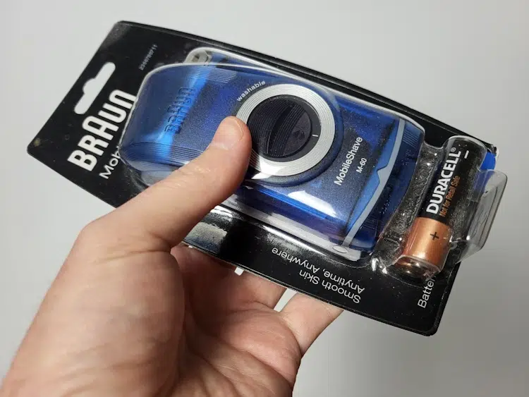Braun MobileShave M-60 held in its packaging