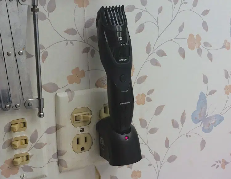 Panasonic ER-GB42 Beard Trimmer on charge plugged in to the socket