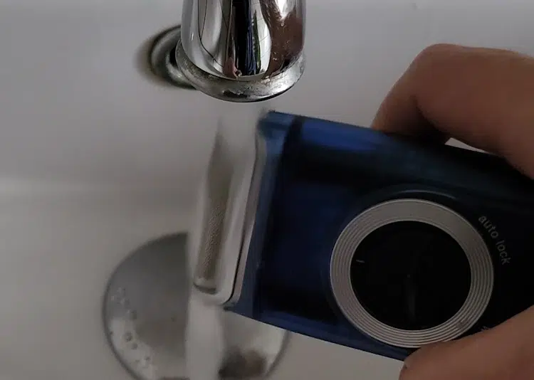 cleaning the Braun MobileShave M-60 under bathroom sink tap