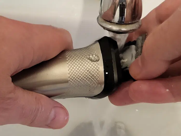 cleaning the Philips Norelco Multigroom MG7750 under the tap