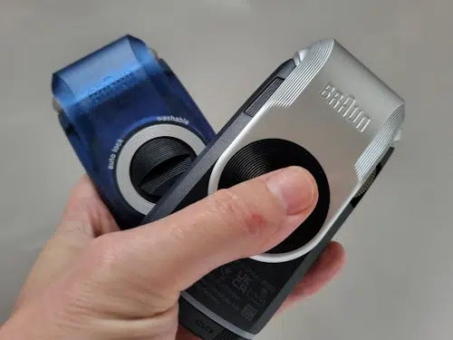 holding both the Braun MobilShave M-60 and M-90 together
