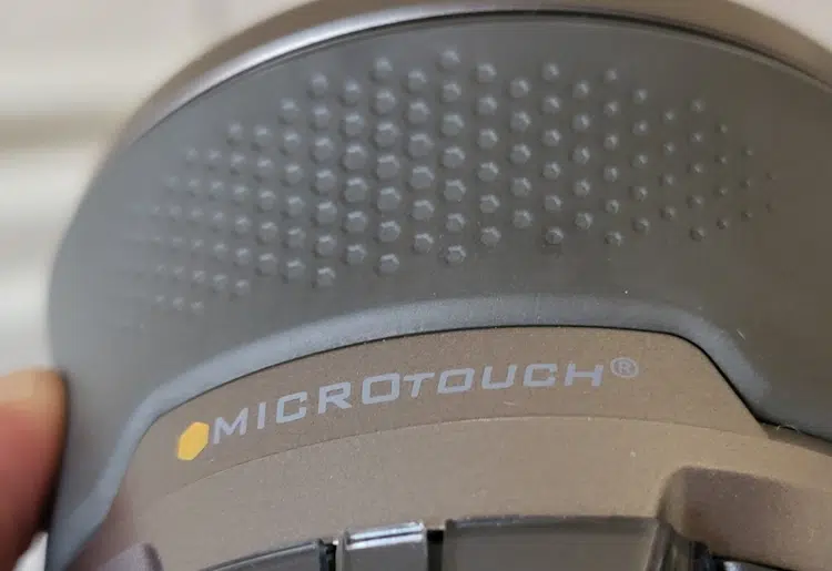 close up of Microtouch Titanium Head Shaver rubberized grip