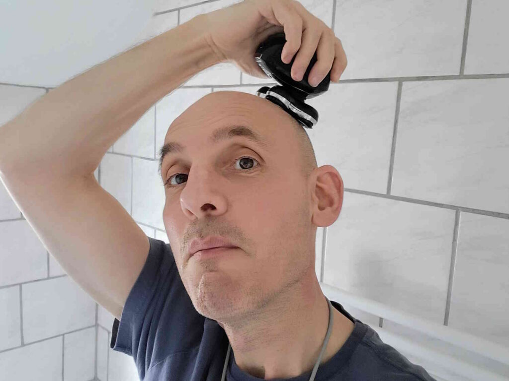 Jason the reviewer head shaving with the Remington Balder Pro