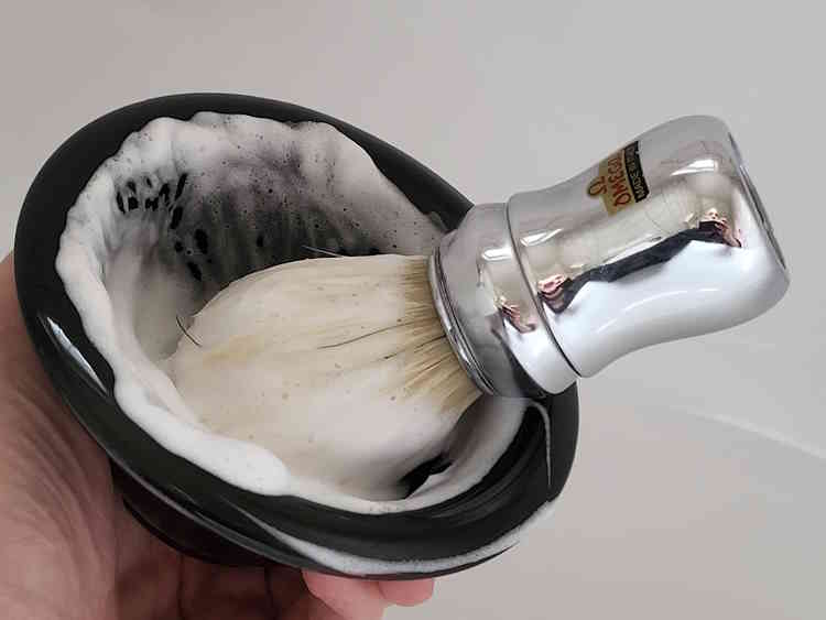Omega shaving brush inside MÜHLE Porcelain Shaving Bowl and lather