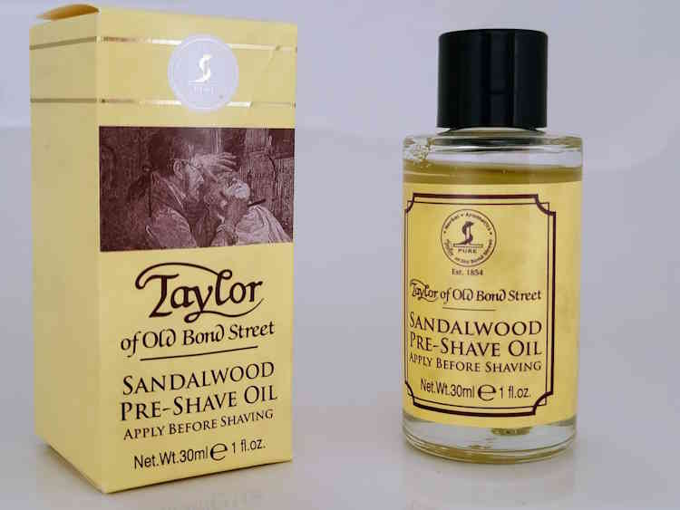 Taylor of Old Bond Street Sandalwood Pre-Shave Oil bottle next to its box