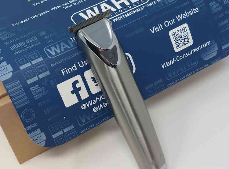 Wahl Stainless Steel Lithium-Ion 2.0 Beard Trimmer leaning against its box