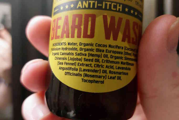 close up of Medicine Man Beard Wash ingredients on the bottle