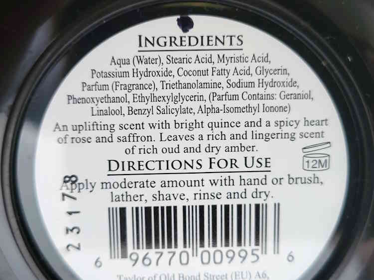 close up of TOBS Oud Shaving Cream ingredients on the back of the tub