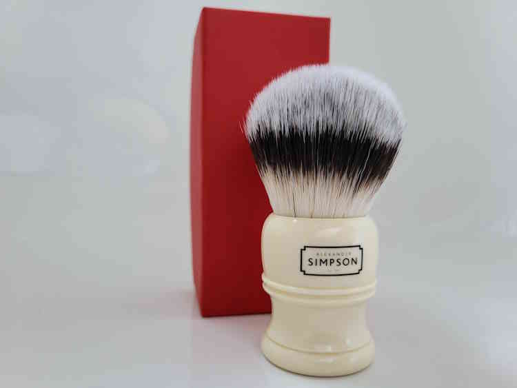Simpson Trafalgar T3 Sovereign Synthetic Shaving Brush standing next to its box