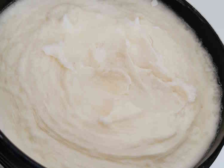 Taylor of Old Bond Street Oud Shaving Cream tub open showing the top of the cream