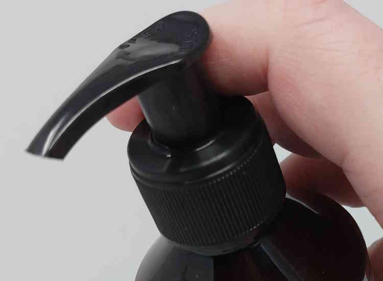 close up of Proraso Beard Wash bottle locking screw top