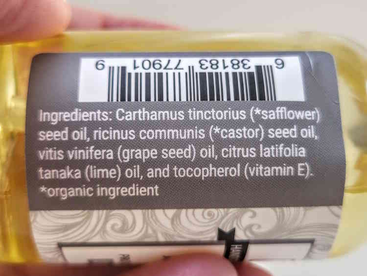 close up of Taconic Pre Shave Oil ingredients on the back of the bottle