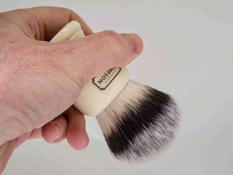 holding a Simpson Trafalgar T3 Synthetic Brush at an angle