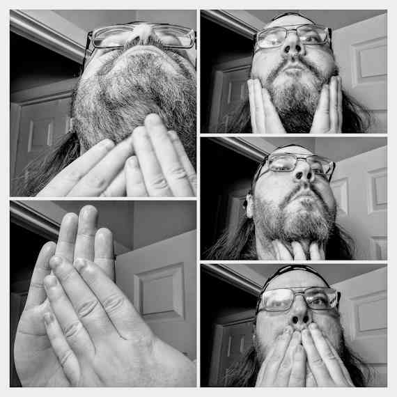 reviewer Robert applying Beard Oil on his beard to test