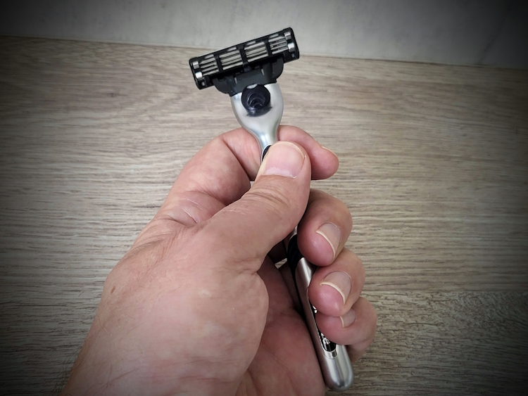 holding Gillette Mach3 razor