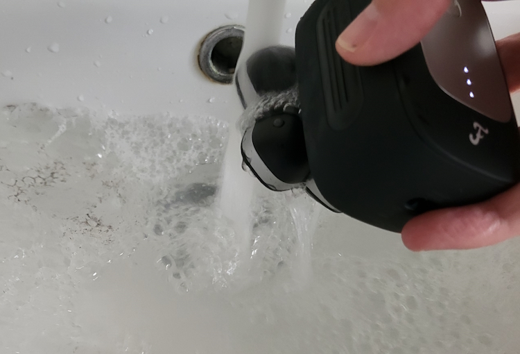 cleaning the FlexSeries Pro under running tap water