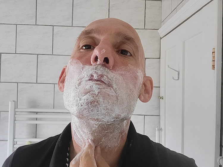 massaging Bump Patrol shave gel into stubble