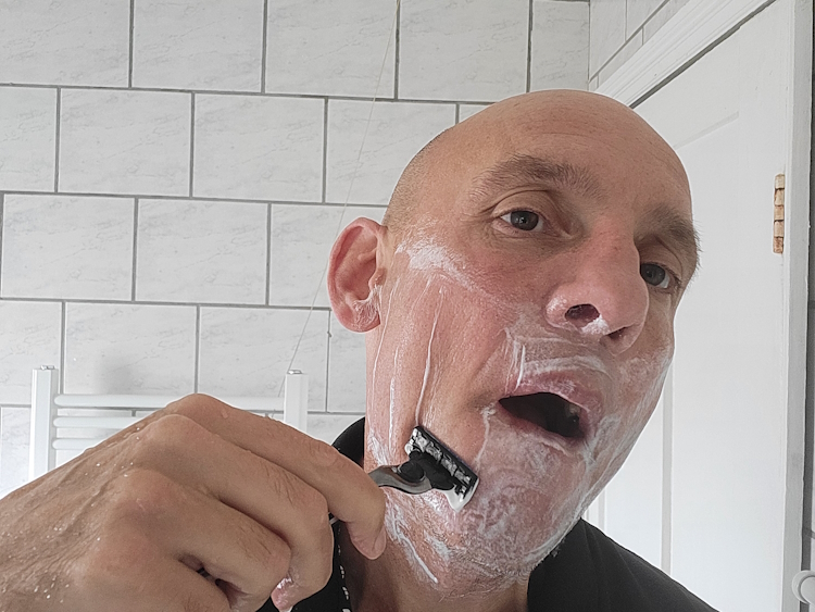 shaving with Bump Patrol shaving gel and mach3 razor