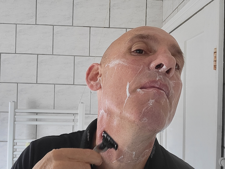 shaving with Bump Patrol shaving gel and mach3 razor