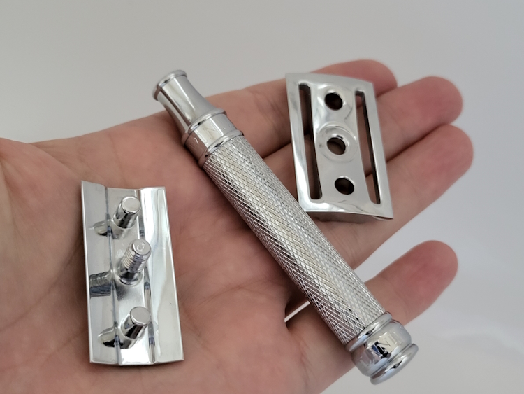 Edwin Jagger DE89 safety razor in three parts on the hand