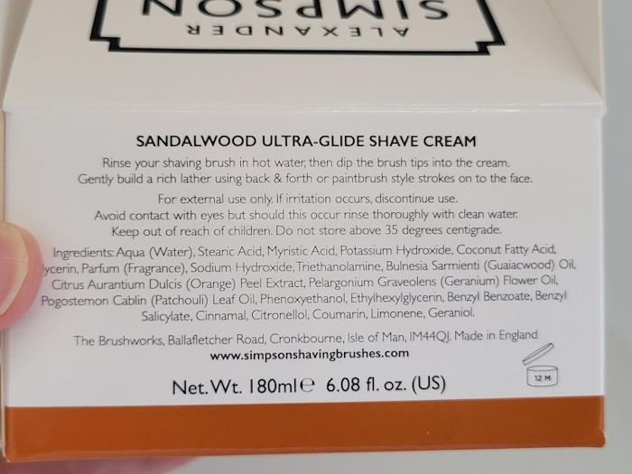 close up of Simpson Sandalwood Shaving Cream ingredients on its box