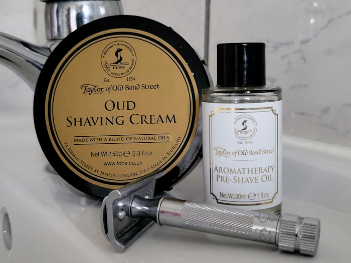 Taylor of Old Bond Street Aromatherapy Pre-Shave Oil with TOBS shaving cream and razor on bathroom sink