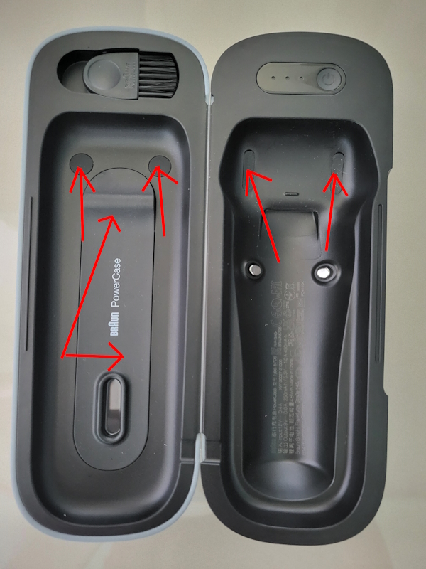 Braun PowerCase with arrows pointing to rubberized sections that hold shaver inside comfortably