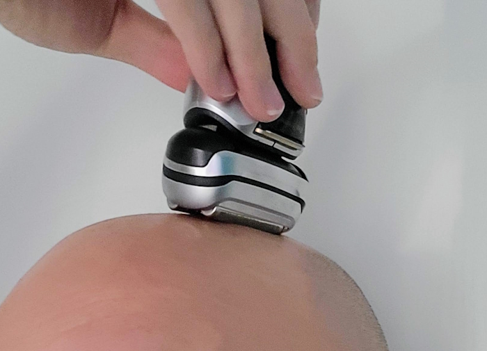 close up view of Braun Series 9 Pro Plus shaving the top of the head