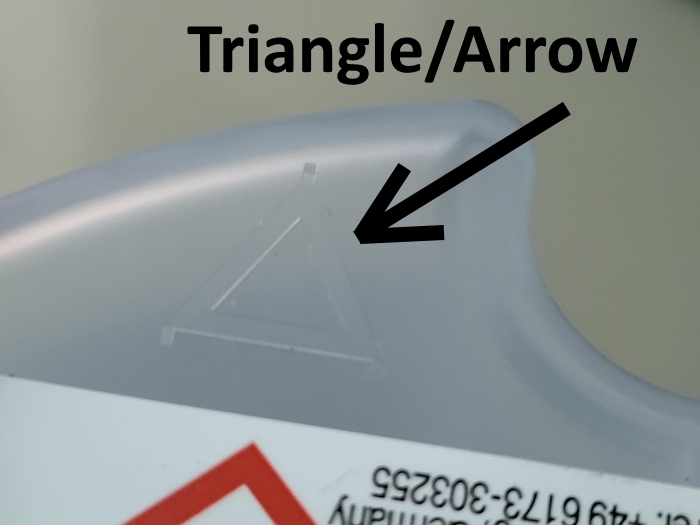 arrow on cartridge provides direction for inserting